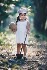 Full length of girl playing at park