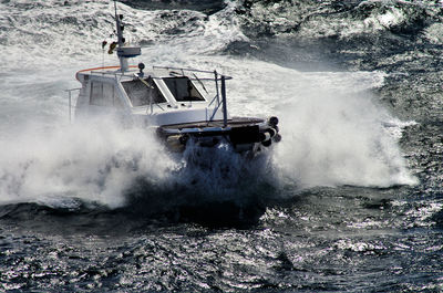 Boat sailing in sea