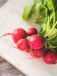 Close-up of cherries on table