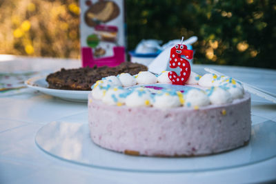 Close-up of birthday cake in plate