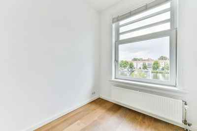 View of empty room through window