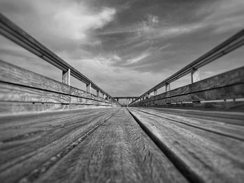 Surface level of bridge against sky