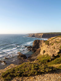 Scenic view of sea against clear sky