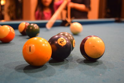 Close-up of orange balls on table