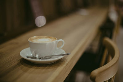 Close-up of cappuccino on table