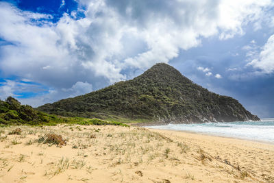 Scenic view of beach against sky