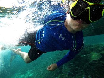 Man swimming in sea