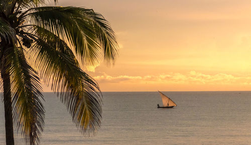 Scenic view of sea against sky at sunset