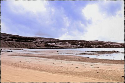 Scenic view of beach against sky