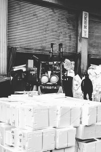 People working at market stall