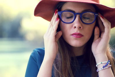 Portrait of young woman wearing sunglasses