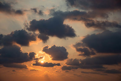 Low angle view of dramatic sky during sunset