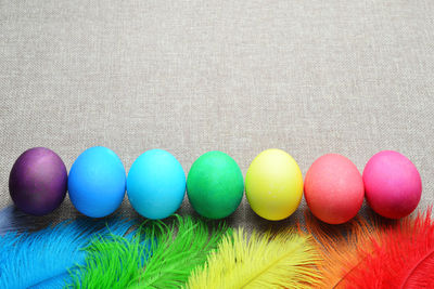 Close-up of multi colored eggs on table
