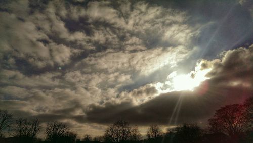 Low angle view of cloudy sky at sunset