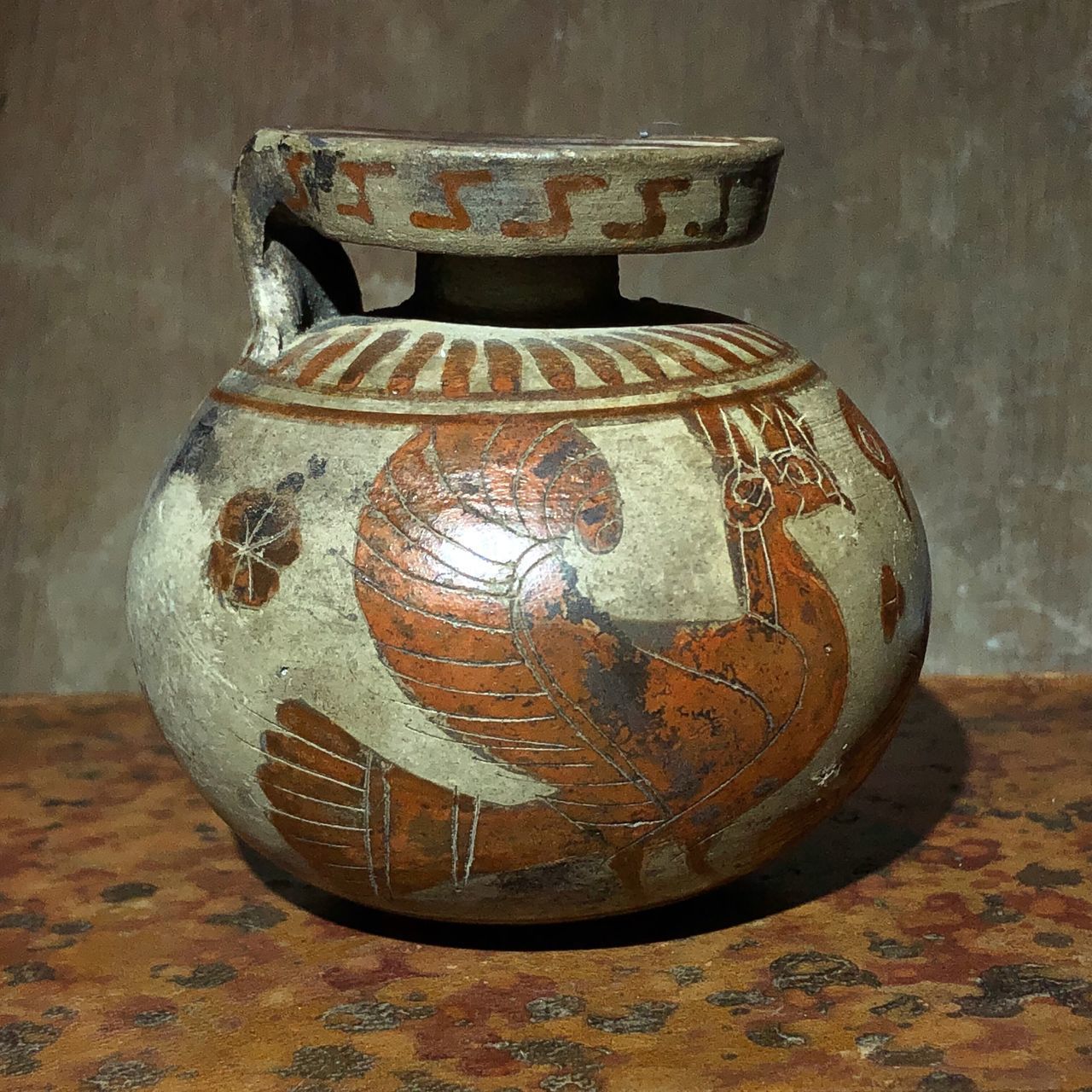 CLOSE-UP OF OLD TEA LIGHT ON TABLE