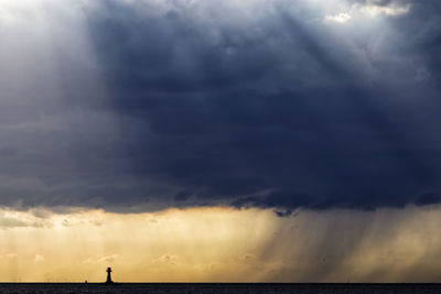 Storm clouds in sky during sunset