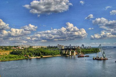 View of city against cloudy sky