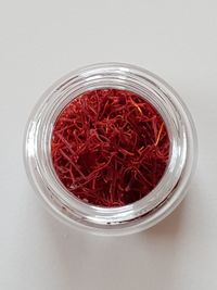 High angle view of glass jar on white background