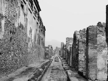 View of narrow alley along buildings