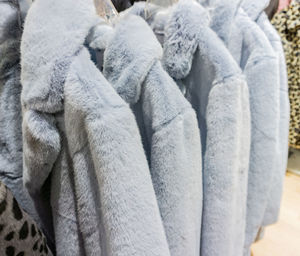 Close-up of warm clothing in store