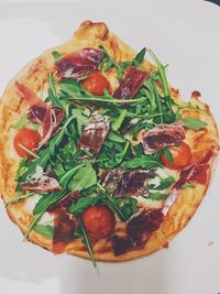 High angle view of pizza served in plate