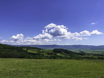 Scenic view of land against sky