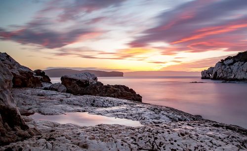 Scenic view of sea against sky during sunset