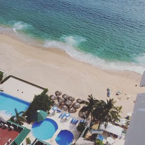 High angle view of beach against blue sky