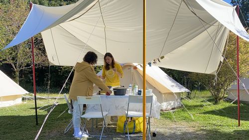 People enjoying the camping fun in summer 