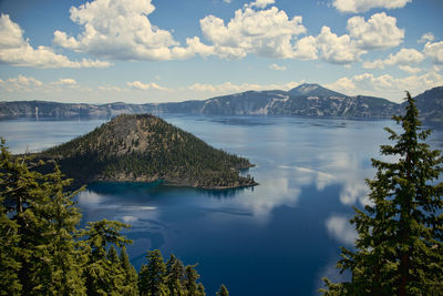 Scenic view of crater lake against sky 