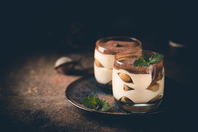 Close-up of drink in glass jar on table