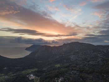 Scenic view of mountains against sky during sunset