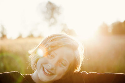 Portrait of smiling girl in evening light