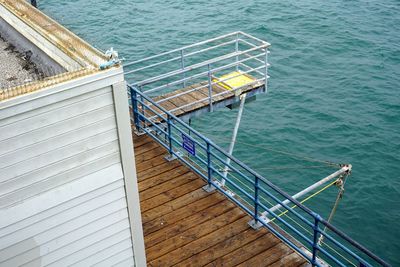 High angle view of pier over sea against sky