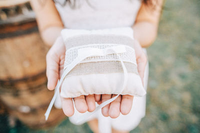 Close-up of woman holding hands