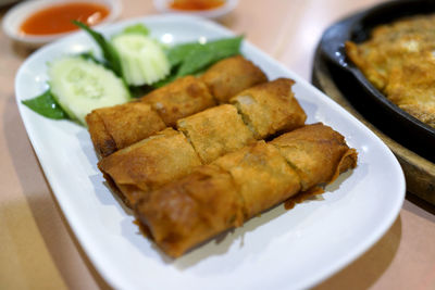 Close-up of served food in plate