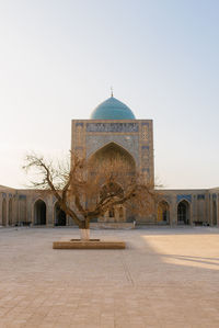 Bukhara, uzbekistan. december 2022. kalyan mosque on a sunny day