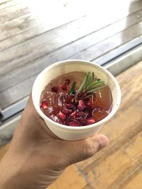 Close-up of hand holding food