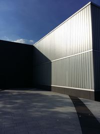 Shadow of building against sky