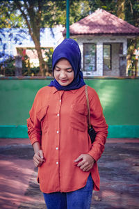 Full length of boy standing outdoors