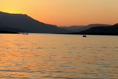 View of calm sea at sunset