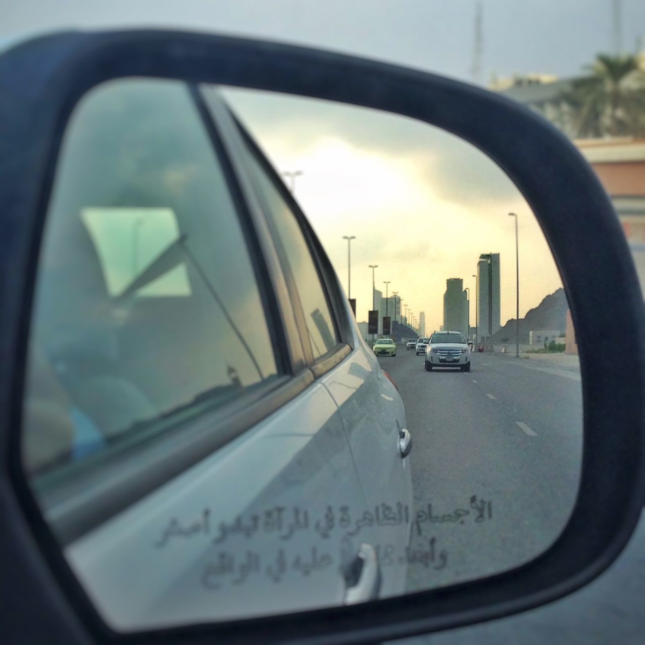 transportation, mode of transport, car, land vehicle, vehicle interior, car interior, road, travel, windshield, glass - material, close-up, part of, on the move, side-view mirror, street, sky, journey, transparent, dashboard, vehicle