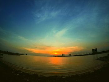 Scenic view of sea at sunset