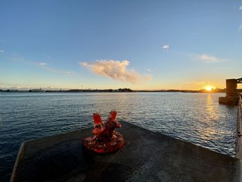 Scenic view of sea against sky during sunset