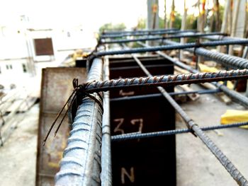 Close-up of rusty metal railing of old building