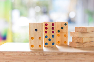 Close-up of wooden dominoes on table