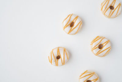 Directly above shot of food on white background