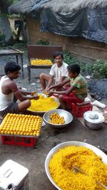 People at market stall