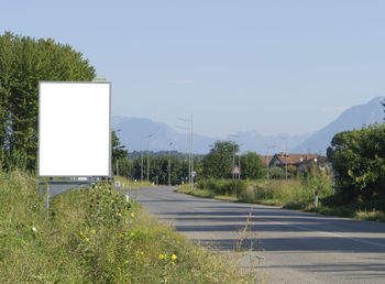 Empty road against clear sky