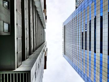 Low angle view of skyscrapers against sky